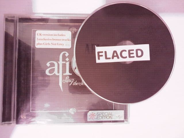 AFI-Sing_the_Sorrow_UK_Retail_-_450_448-2_B_-CD-FLAC-2003-FLACED