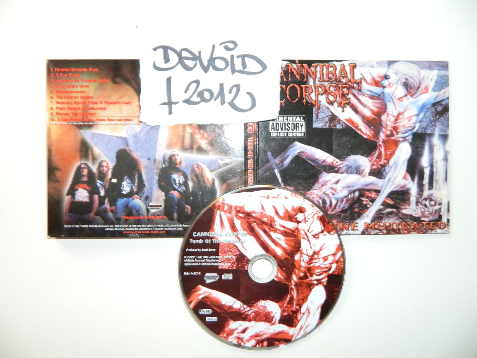Cannibal_Corpse-Tomb_Of_The_Mutilated-REISSUE-CD-FLAC-2002-DeVOiD