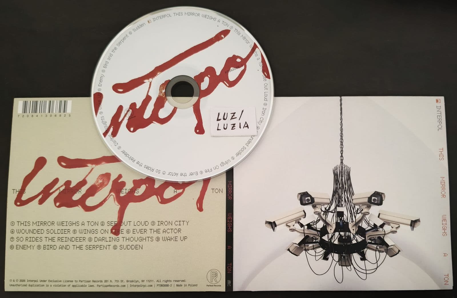 Interpol-This_Mirror_Weighs_A_Ton-_PTSN3068-2_-CD-2026-LUZ