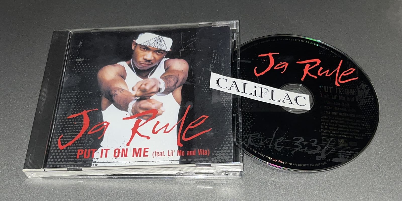 Ja_Rule-Put_It_On_Me_feat._Lil_Mo_and_Vita_-Promo-CDS-FLAC-2000-CALiFLAC