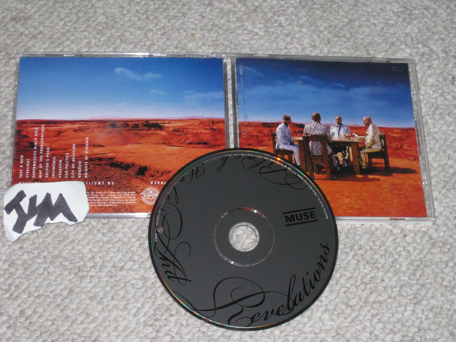 Muse-Black_Holes_And_Revelations-CD-FLAC-2006-JLM