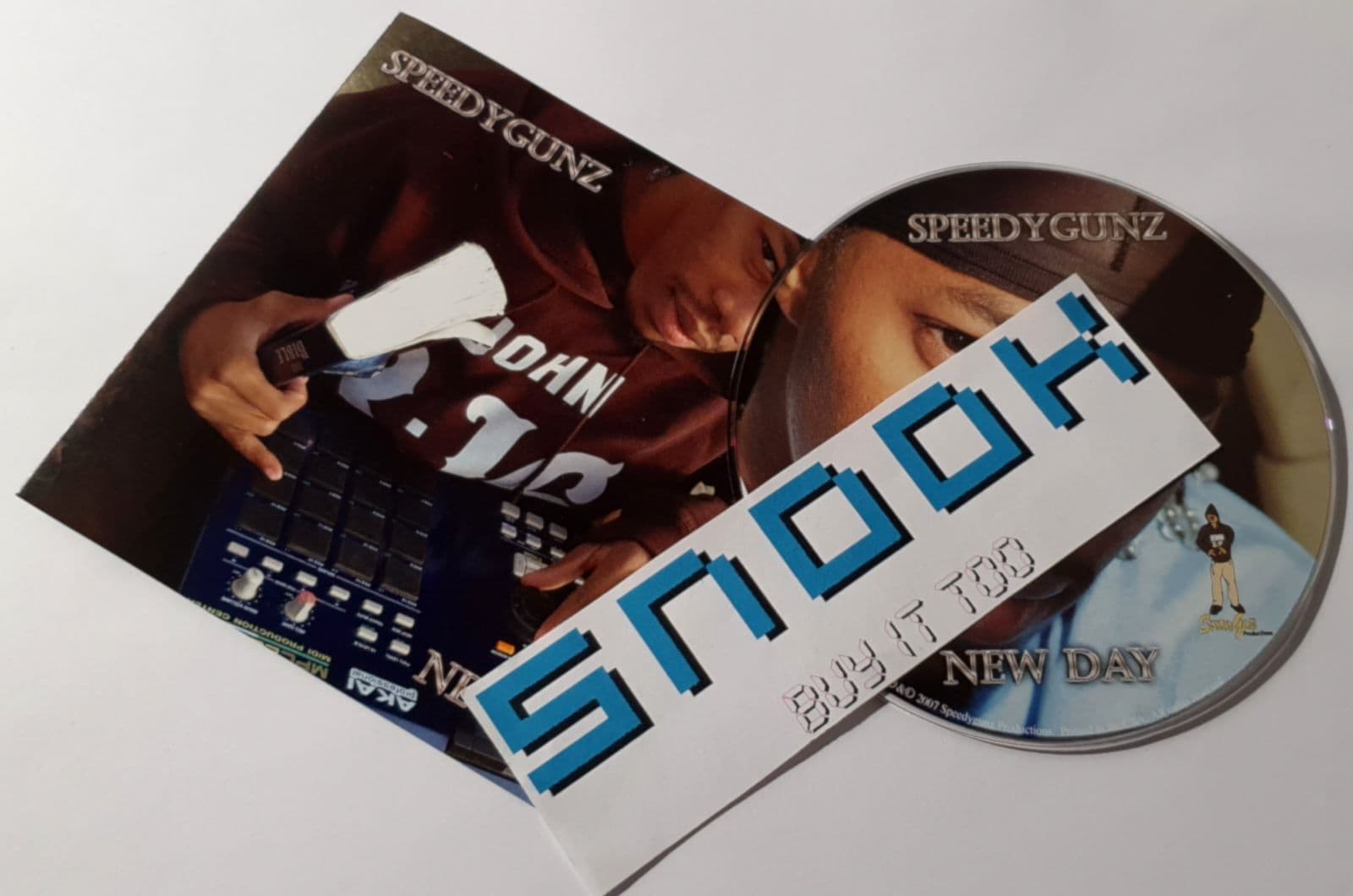 Speedygunz-New_Day-CD-FLAC-2007-SNOOK