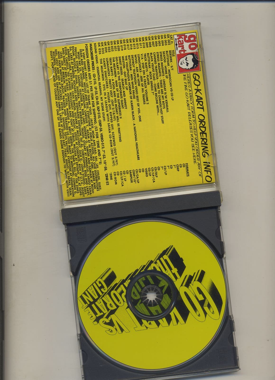 VA--Go-Kart_vs_The_Corporate_Giant-SAMPLER-CD-FLAC-1997-MEOWZiK