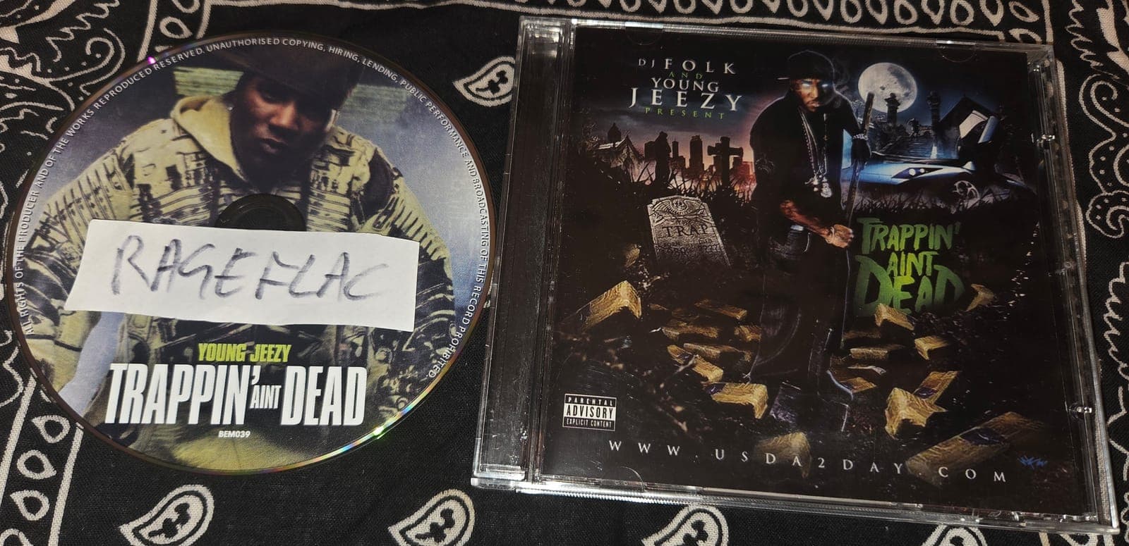 Young_Jeezy-Trappin_Aint_Dead-BOOTLEG-CD-2009-RAGEMP3